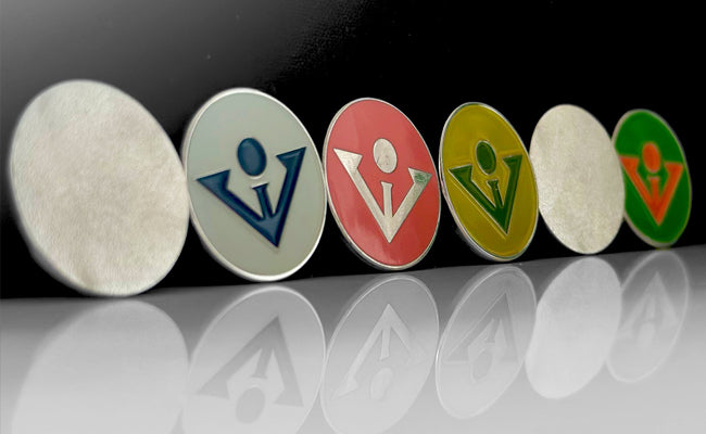 5 Magnetic ball markers by VivanTee lined up next to each other in various colors and designs.