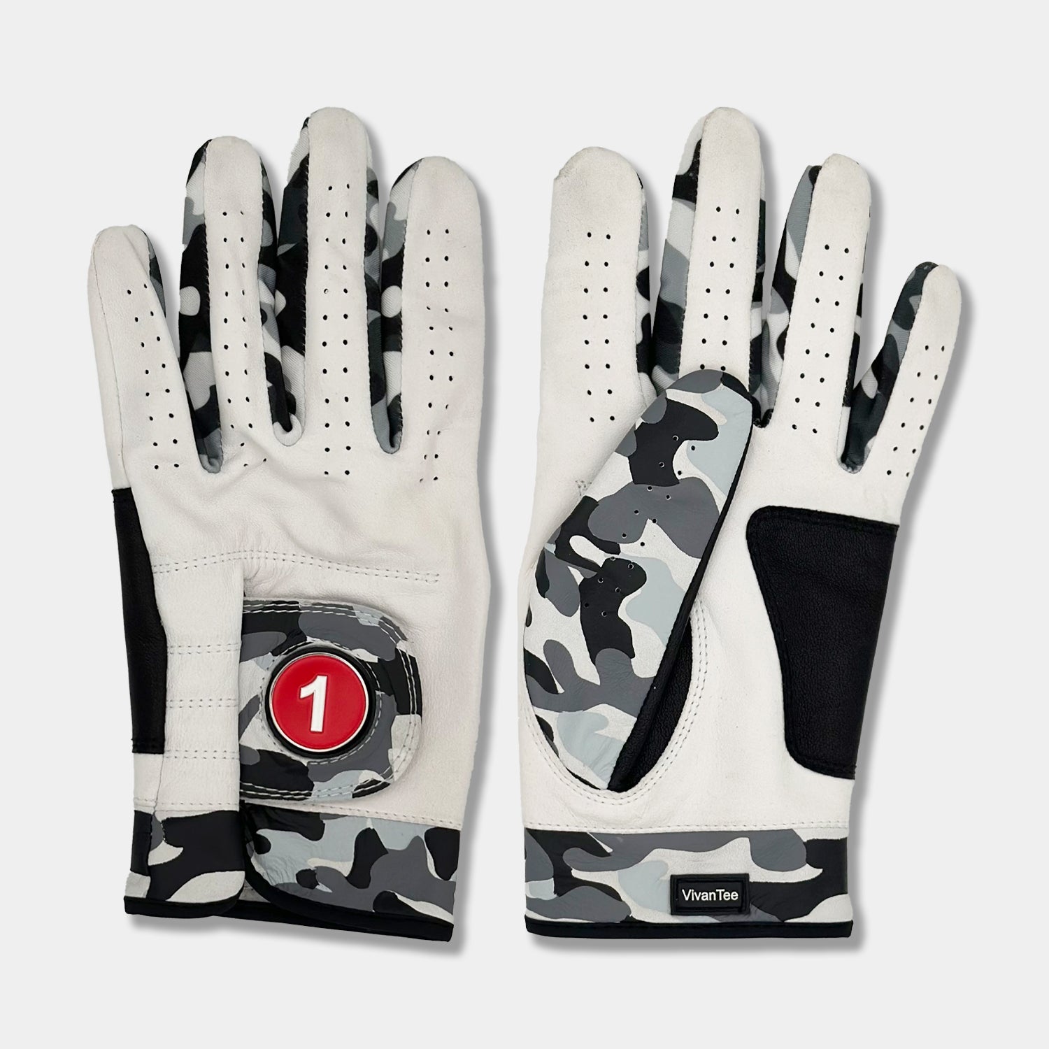 Pair of men's ghost camo golf glove with a red magnetic ball marker laid down showing the camo design on front and back of the golf glove.